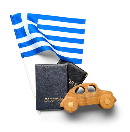 Flag of Greece, passports and wooden car isolated on white background. travel conceptの写真素材