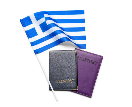 Flag of Greece and passports isolated on white backgroundの写真素材