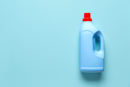 Bottle of detergent on blue backgroundの写真素材