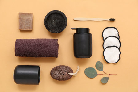 Composition with different bath accessories and eucalyptus branch on color backgroundの写真素材