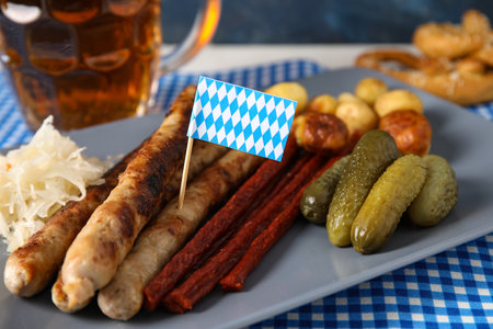 Plate with different snacks on table.の写真素材