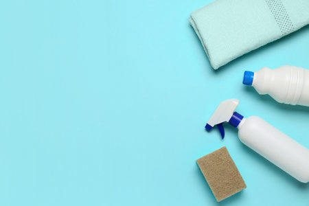 Different cleaning supplies on blue backgroundの写真素材