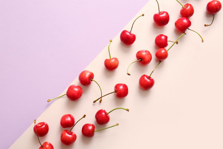 Many sweet cherries on colorful backgroundの写真素材
