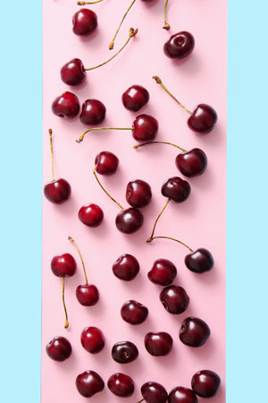 Many sweet cherries on colorful backgroundの写真素材