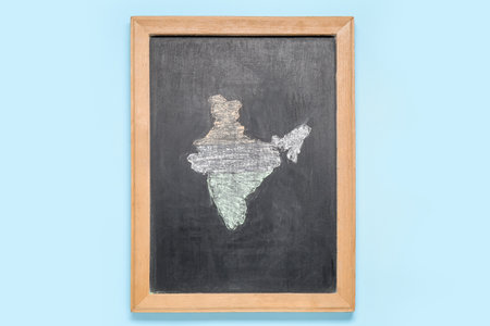 Blackboard with drawn Indian continent on blue backgroundの写真素材