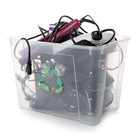 Recycle bin with different household appliances on white background
