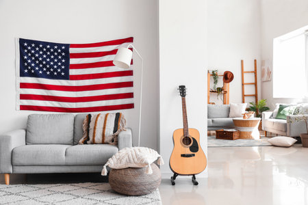 Interior of modern living room with hanging USA flagの写真素材