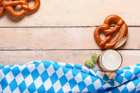 Flag of Bavaria, mug with beer and pretzels on white wooden backgroundの写真素材