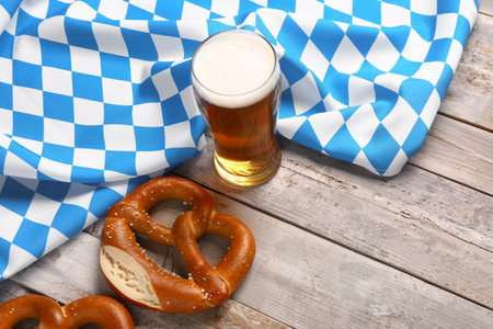 Flag of Bavaria, mug with beer and pretzel on gray wooden backgroundの写真素材
