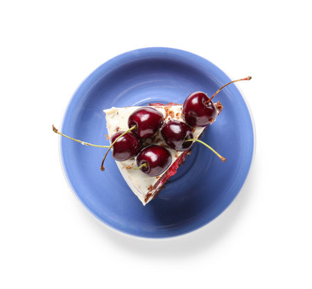 Plate with piece of tasty cherry cake isolated on white backgroundの写真素材
