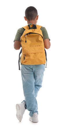 Little African-American schoolboy with backpack on white background, back viewの写真素材