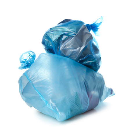Garbage bags with different trash isolated on white backgroundの写真素材