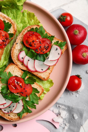 Plate with delicious radish bruschettas, closeupの写真素材