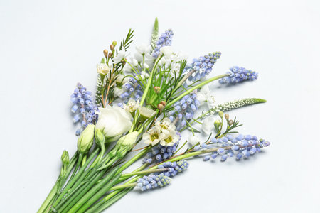 Beautiful bouquet with different flowers on gray backgroundの写真素材
