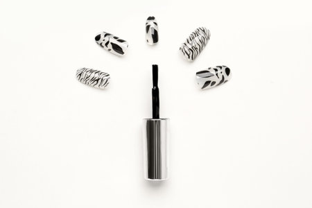Press-on nails with brush on white background