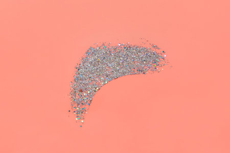 Silver glitter stroke on pink backgroundの写真素材