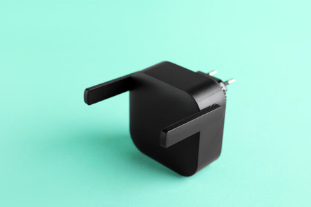 Black WiFi repeater on turquoise backgroundの写真素材