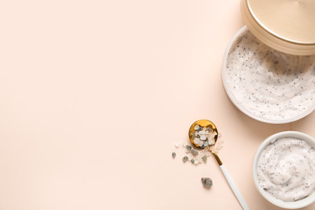Jar of natural body scrub and sea salt on color backgroundの写真素材