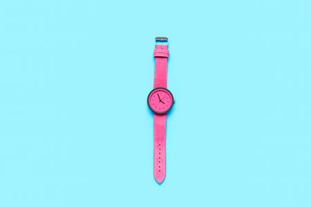 Stylish female wrist watch on color backgroundの写真素材