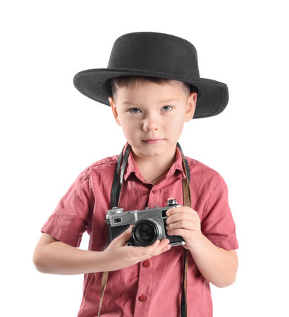 Cute little photographer with camera on white backgroundの写真素材