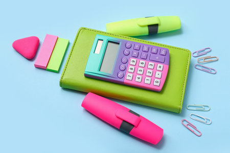 Stationery in shape of rocket on blue backgroundの写真素材