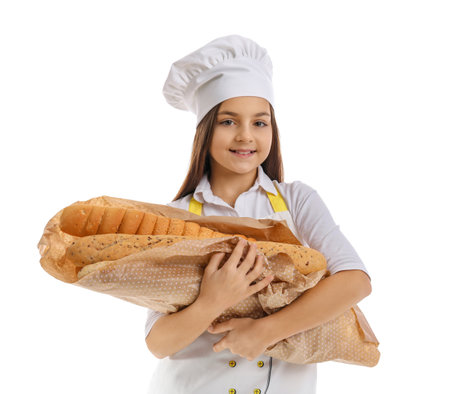Little baker with fresh baguettes on white backgroundの写真素材