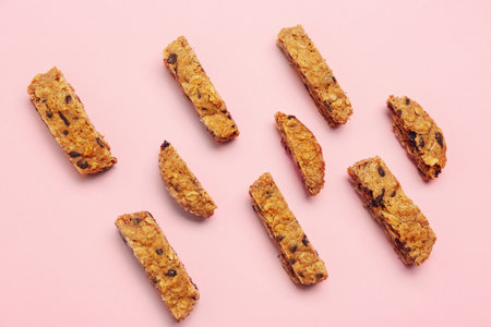 Tasty biscotti cookies on pink backgroundの写真素材