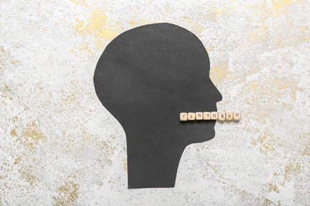 Paper human head with word CENSORED on grunge backgroundの写真素材