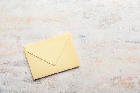 Yellow envelope on grunge background. message conceptの写真素材