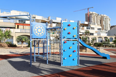 View of children's playground with slide at sea resortの写真素材