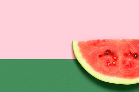 Piece of fresh watermelon on colorful background