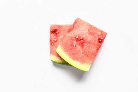 Pieces of fresh watermelon on white backgroundの写真素材