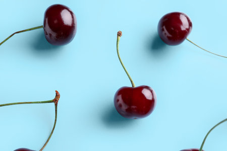 sweet cherry on blue backgroundの写真素材