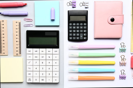 Modern calculators with different stationery on color backgroundの写真素材
