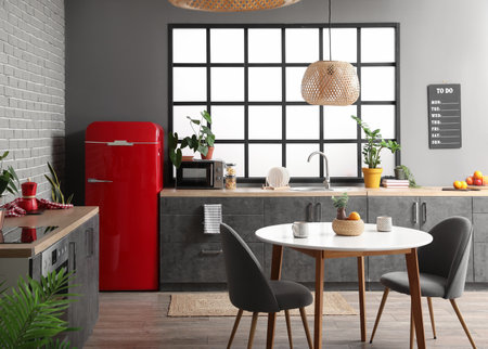 Interior of modern kitchen with stylish refrigeratorの写真素材