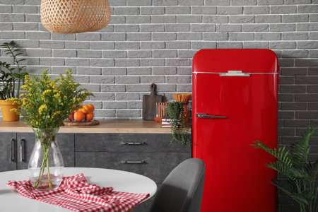 Interior of modern kitchen with stylish refrigeratorの写真素材