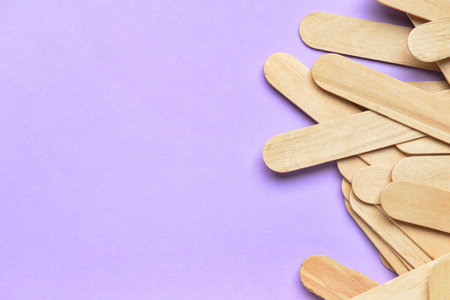 Ice cream sticks on purple background, closeupの写真素材