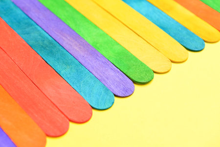 Colorful ice cream sticks on beige background, closeupの写真素材