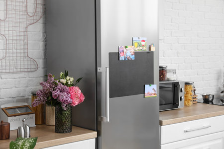 Chalkboard on door of refrigerator in kitchenの写真素材
