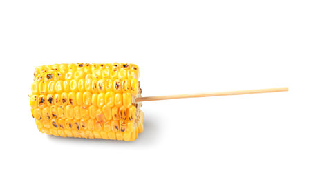 Tasty grilled corn cob skewer on white backgroundの写真素材
