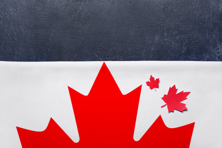 Flag of Canada on blue backgroundの写真素材