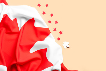 Flag of Canada, paper stars and maple leaf on orange backgroundの写真素材