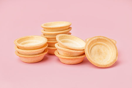 Homemade tartlets on pink backgroundの写真素材