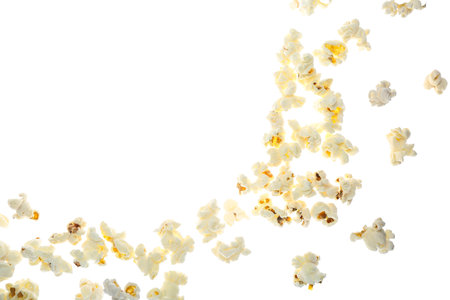 Flying tasty popcorn on white backgroundの写真素材