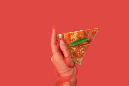 Woman holding slice of tasty pizza on red background