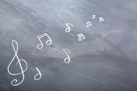 Different music notes on black backgroundの写真素材