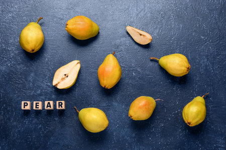 Word PEAR and fresh fruits on blue backgroundの写真素材