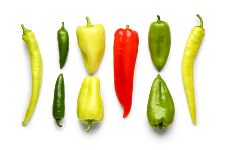 Different fresh peppers on white backgroundの写真素材