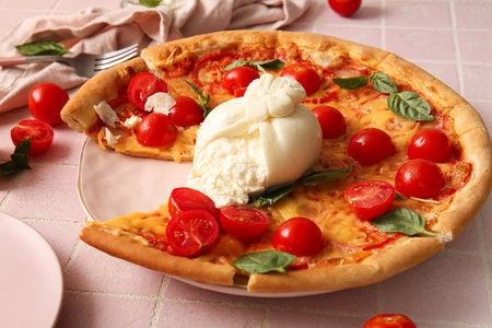 Plate of tasty pizza with Burrata cheese on pink tileの写真素材