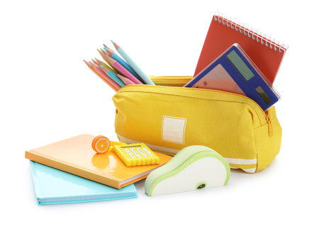Notebooks and school stationery on white backgroundの写真素材